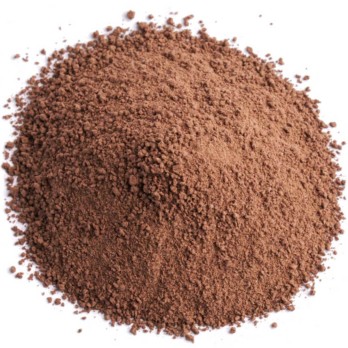 Image shows a small pile of dark brown powder in a circle on a white background