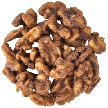 Image shows a circle of walnuts coated in spices on a white background.